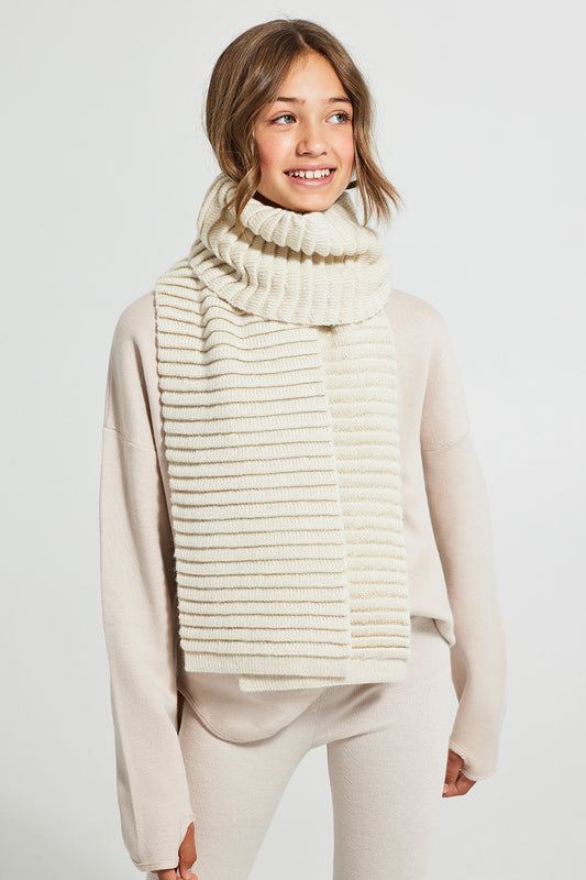 Sentaler Kids (6-14 Years) Ribbed Scarf featured in Baby Alpaca and available in Ivory. Seen from front above the knee.