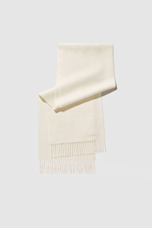 Sentaler Baby Alpaca Classic Scarf featured in Baby Alpaca and available in Ivory White. Seen as off figure folded.