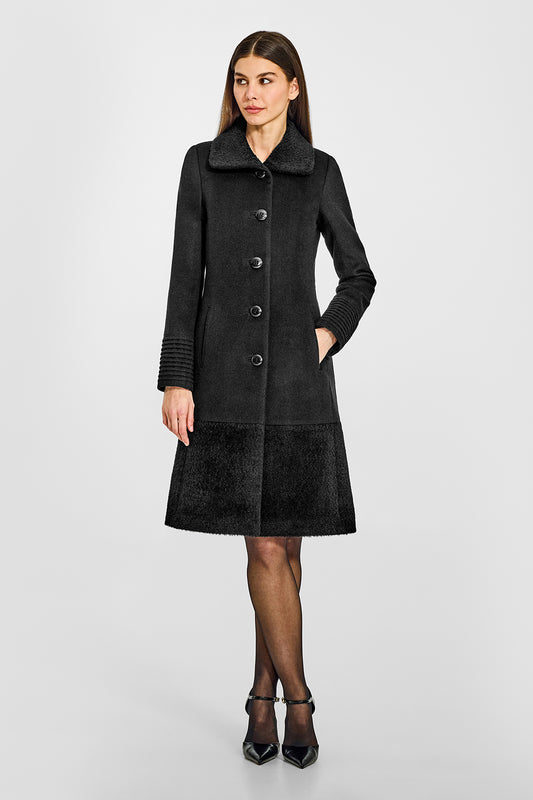 Sentaler A-line Black Coat with Bouclé Alpaca Collar and Trim in Baby Alpaca wool. Seen from front on female model.