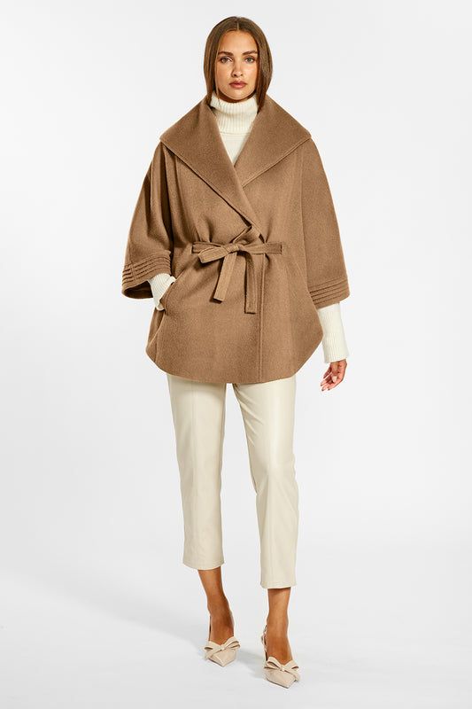Sentaler Cape with Shawl Collar and Belt crafted in Baby Alpaca wool and in Dark Camel. Seen from front on female model belted.