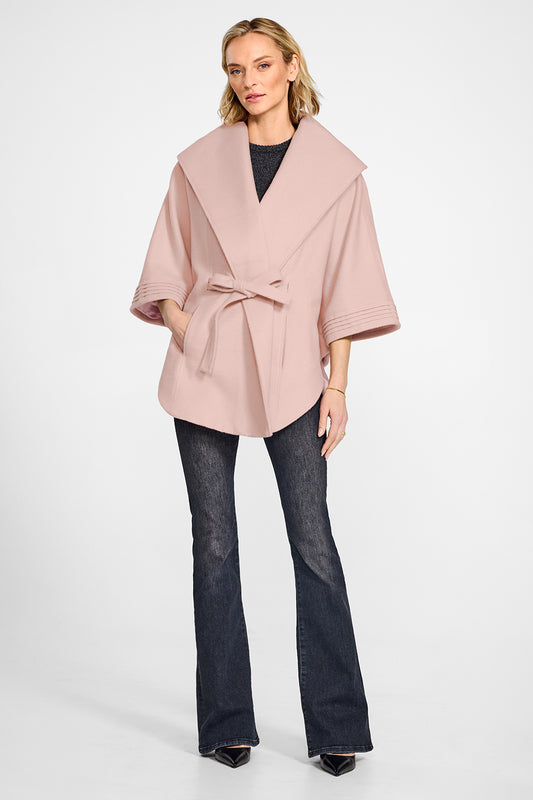 Sentaler Pink Tint Cape with Shawl Collar and Belt in Baby Alpaca wool. Seen from front on female model.