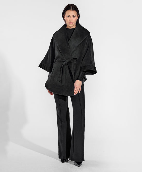Sentaler Cape with Shawl Collar and Belt crafted in Baby Alpaca and in Black. Seen from front on female model.