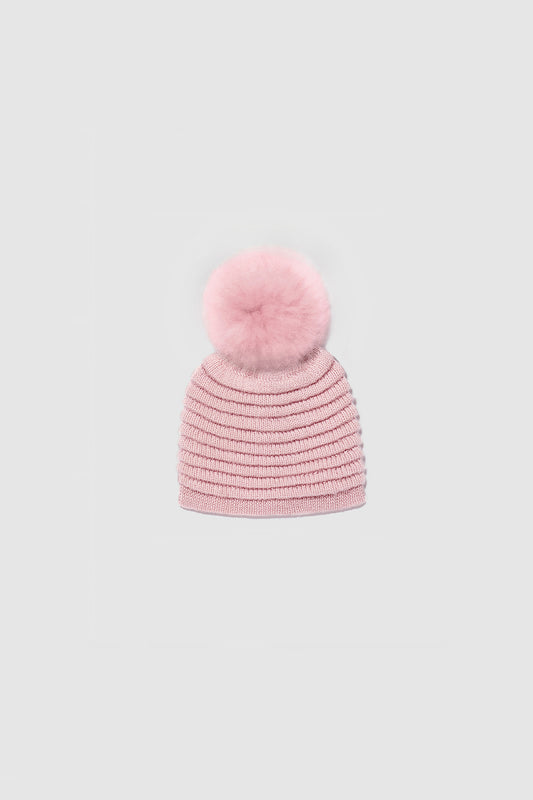 Sentaler Kids (1-5 Years) Ribbed Hat with Oversized Fur Pompon featured in Baby Alpaca and available in Pink. Seen as off figure.