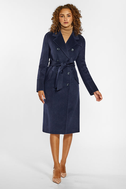 Sentaler Long Double Breasted Trench Coat featured in Baby Alpaca and available in Deep Navy. Seen from front on female model who is wearing the coat belted.